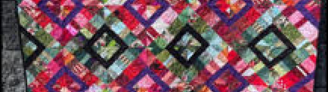 scrap quilt by Carolyn Mulders